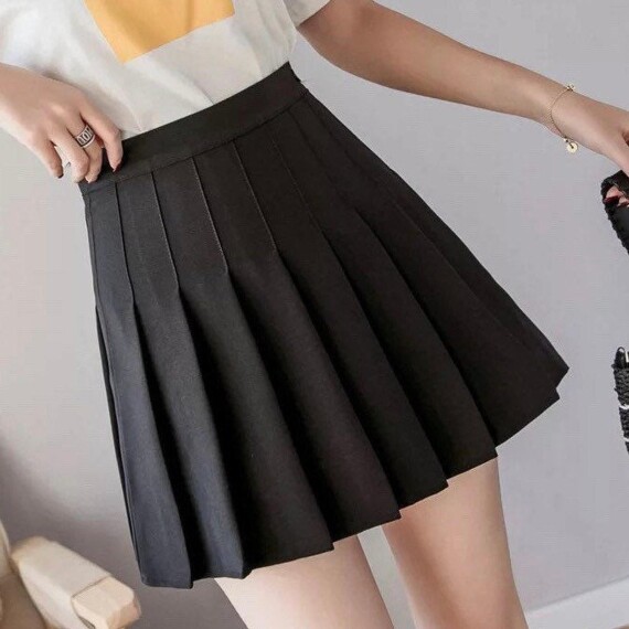 https://uae.kyveli.me/products/pleated-mini-skirt